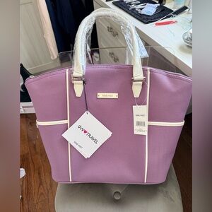Nine West Purple canvas travel tote
NWT. PERFECT fit holiday travel!